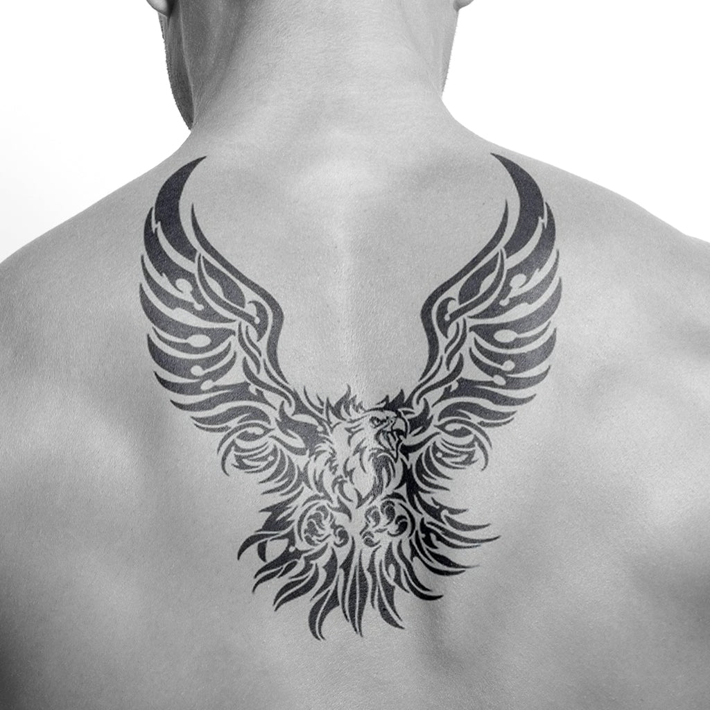 tribal wings tattoo on back