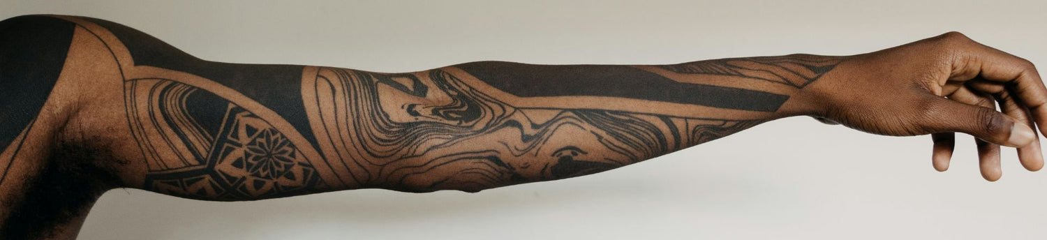 Custom Tattoos Designed on a man's sleeve