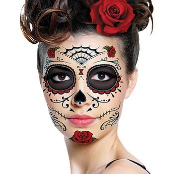 woman wearing day of the dead skull tattoo