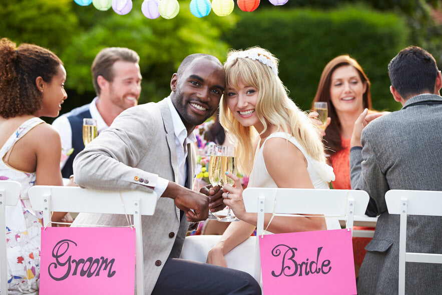 married couple before giving wedding favors