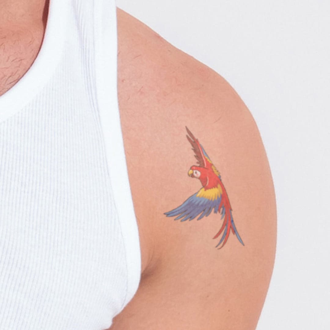 Ornamental parrot tattoo - Tattoogrid.net