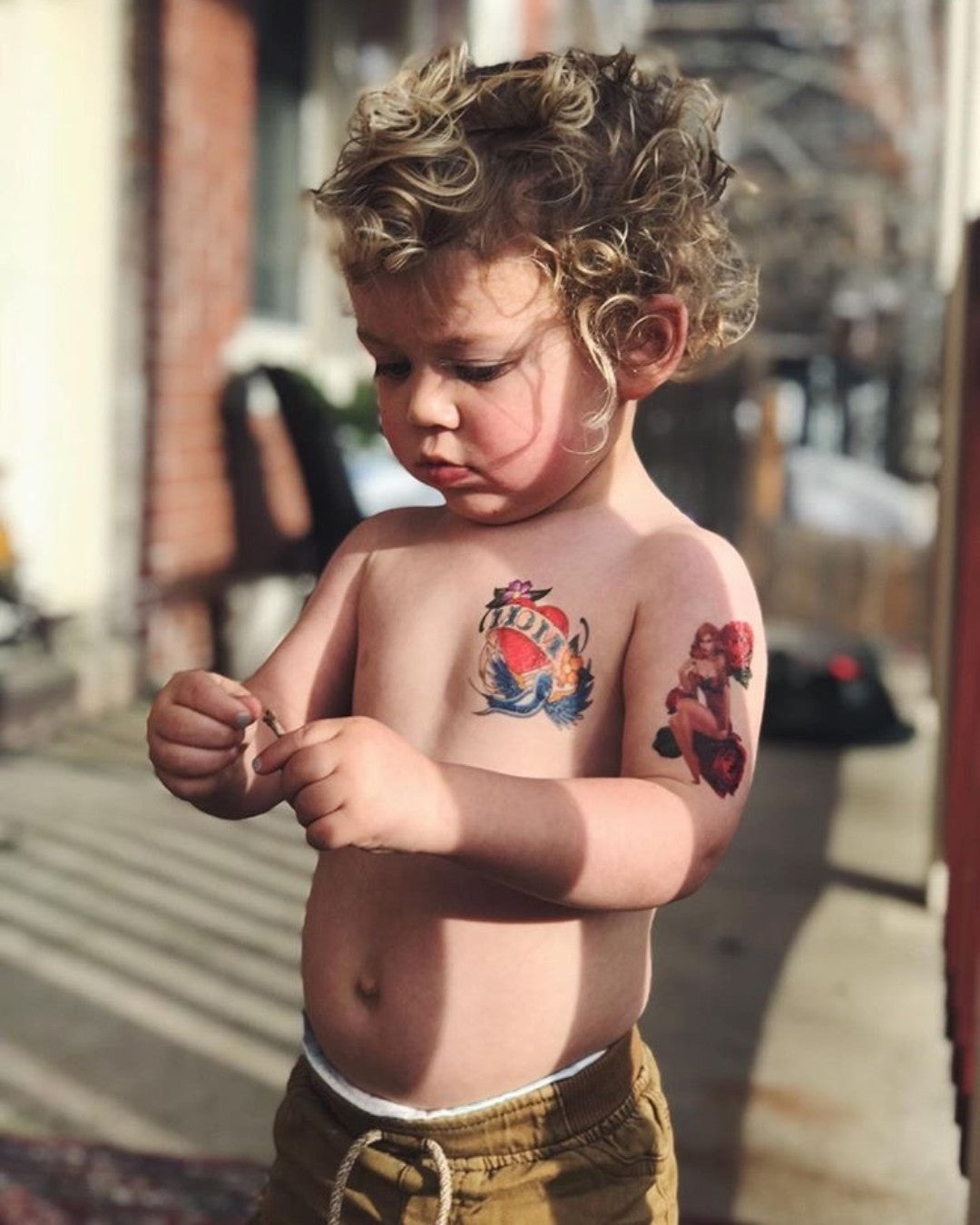 Little boy with tattoos