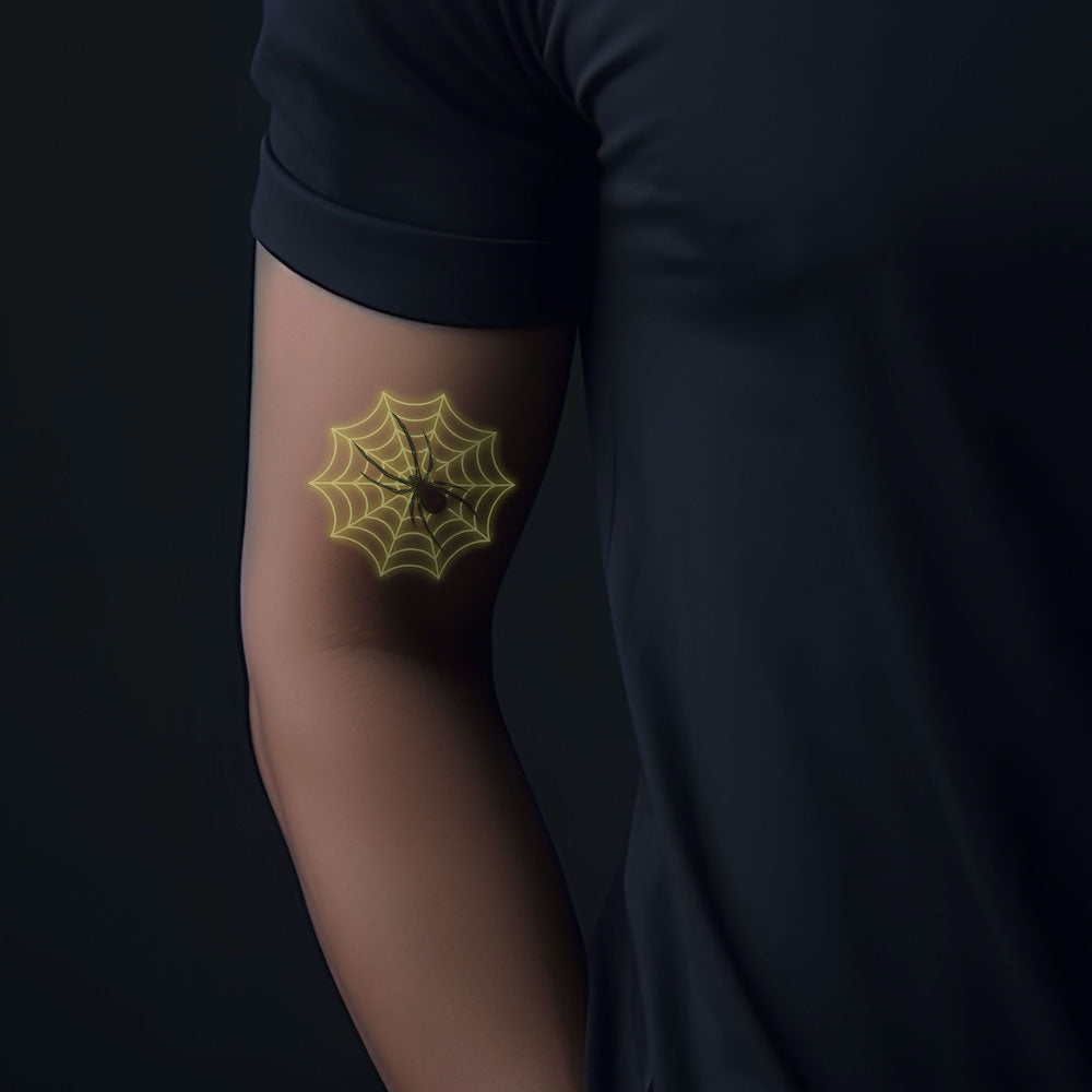 Glow in dark web spider tattoo