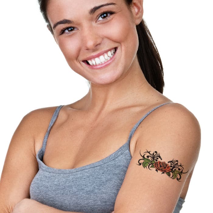 Rose tattoo on the upper back. | Rose neck tattoo, Small rose tattoo, Rose  tattoo on back